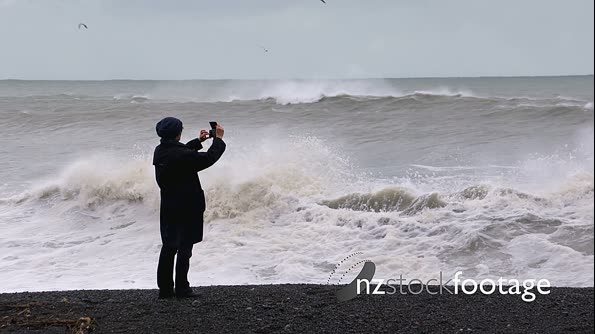 Photographer and storm seas 28159