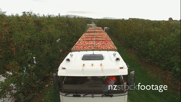 Truck lift over apples aerial HD 25009